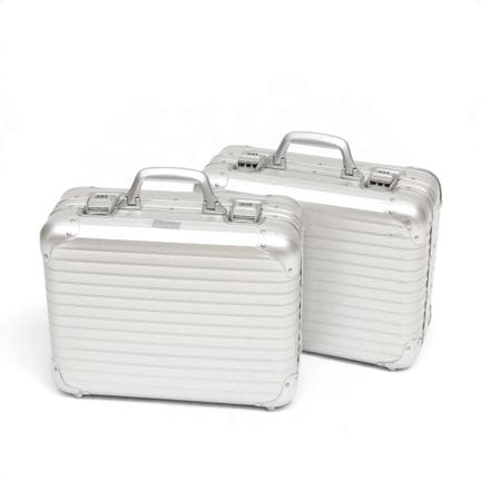 Rimowa, two aluminum suitcases: H 37 x W 44 x D 19