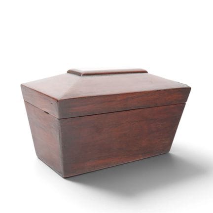 Sarcophagus-shaped mahogany tea chest. Interior wi