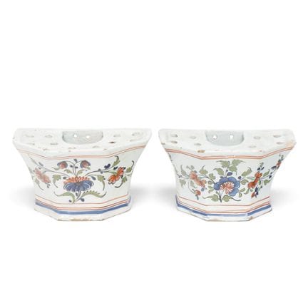 Pair of white earthenware wall planters, 19th cent