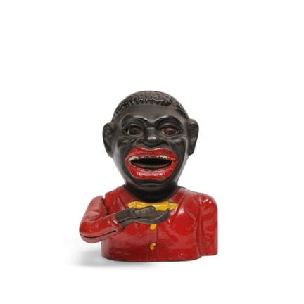 Polychrome painted mechanical piggy bank. Greedy B