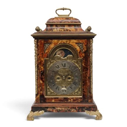 English table clock, 20th century. In faux tortois
