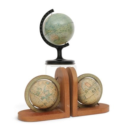Pair of wooden bookends with globes. One of them f