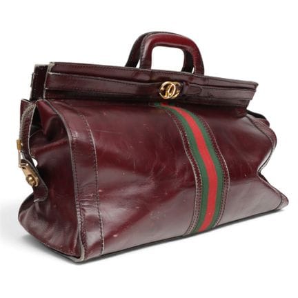 Gucci burgundy leather travel bag, circa the 1980s