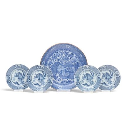 China, set of four transfer-printed saucers featur