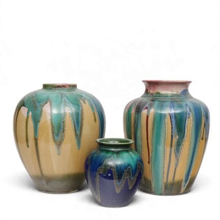 Three earthenware vases with drip glaze, in shades