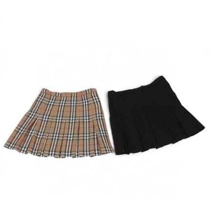 Two Burberry pleated skirts, circa 2010. Showing m