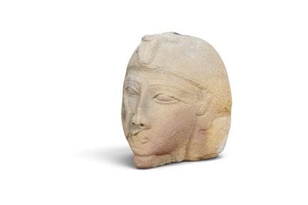 An Egyptian limestone head of a royal figure, poss