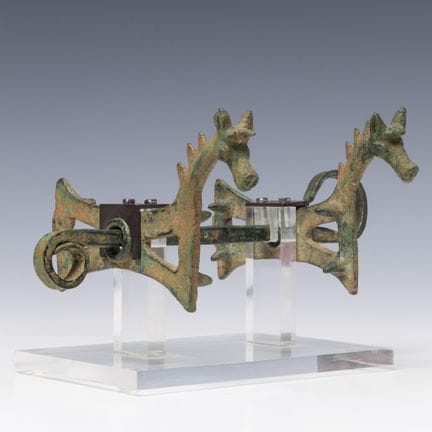 Luristan, a bronze riding bit with horse-shaped ch