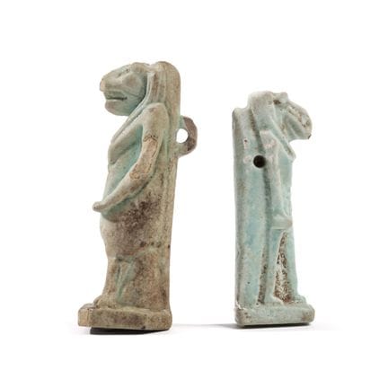 Egitto, due amuleti in faience azzurra; quello più