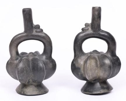 Peru, Chimu, a pair of black terracotta stirrup ve