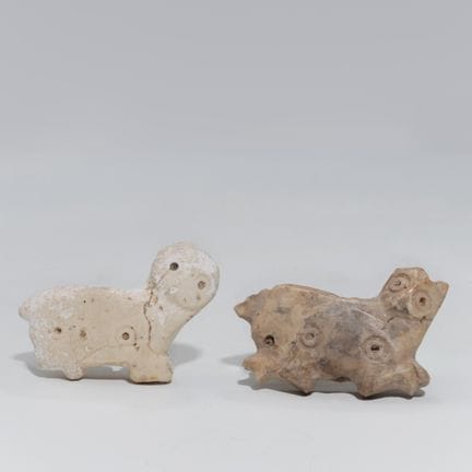Dos amuletos de piedra, del periodo de Djemdet Nas