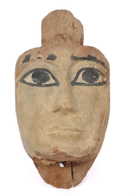 Egypt, a fine small wooden mummy mask from the Lat