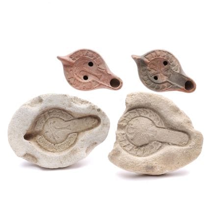 Two Roman terra sigillata oil lamps, with correspo