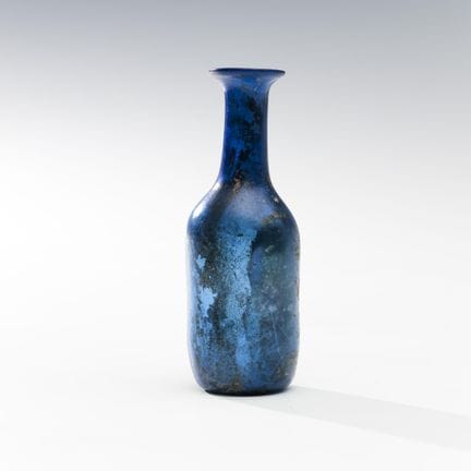 Jolie petite bouteille romaine en verre bleu foncé