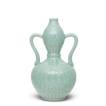 China, a double-gourd vase with a pale green glaze
