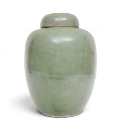 China, a celadon-glazed jar and lid, 19th century;