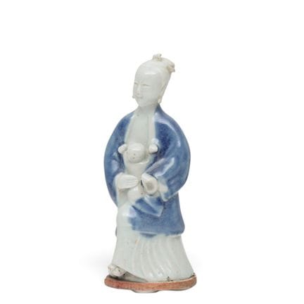 China, a blue-and-white-glazed biscuit figural gro