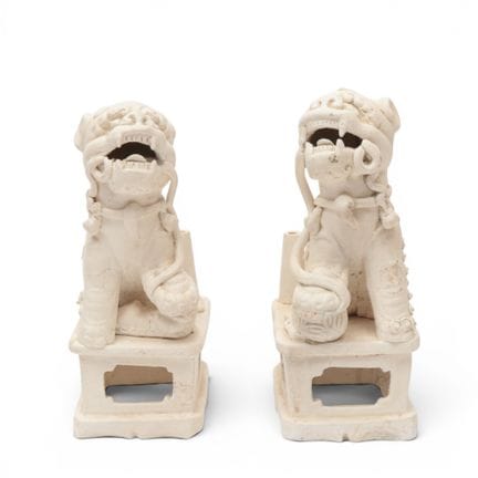 China, a pair of biscuit-ware "Buddhist lion" ince