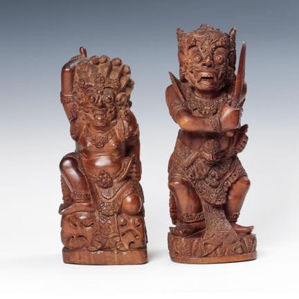 Bali, two finely carved wooden figures depicting d