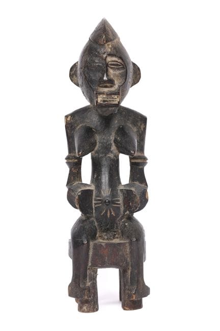 Costa de Marfil, senufo, figura femenina sentada. 