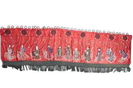 China, a red silk embroidered hanging, early 20th 