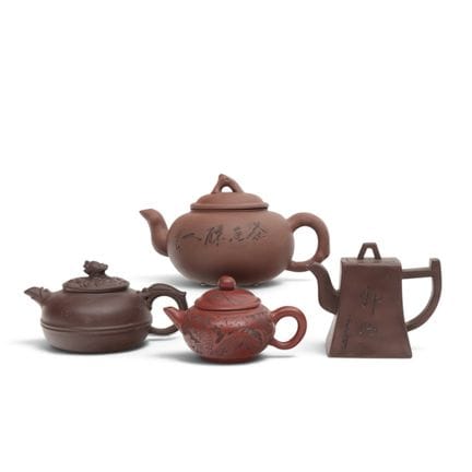 China, four Yixing earthenware teapots and lids, m