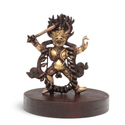 Sino-Tibetan, a partially gilded bronze figure of 