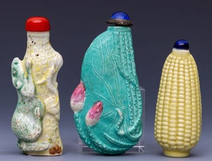 China, three molded porcelain snuff bottles and st