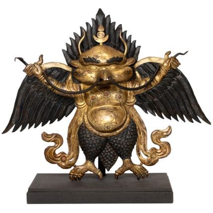 Tibet, a partially gilded copper repoussé figure o