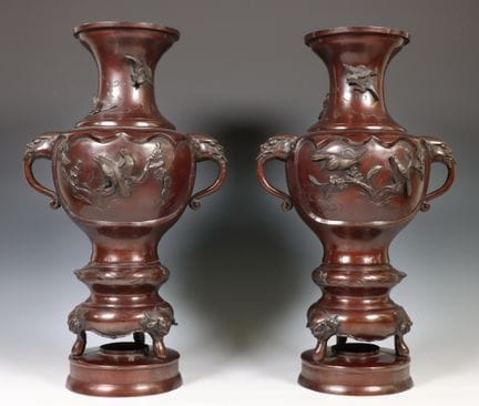 Japan, a pair of patinated bronze vases, Meiji per