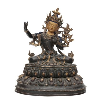 Tibet, a partially gilded bronze figure of Tara, m