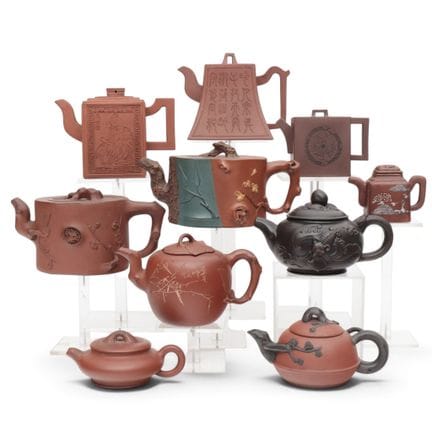 China, a collection of Yixing earthenware teapots 