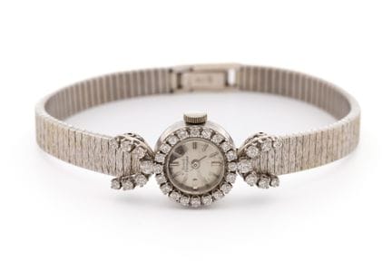 Girrard Perregaux, montre cocktail en diamants.Rem