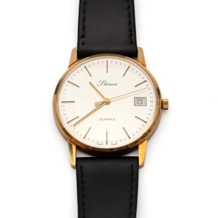 Stereos, une montre-bracelet en or. Quartz. Cadran