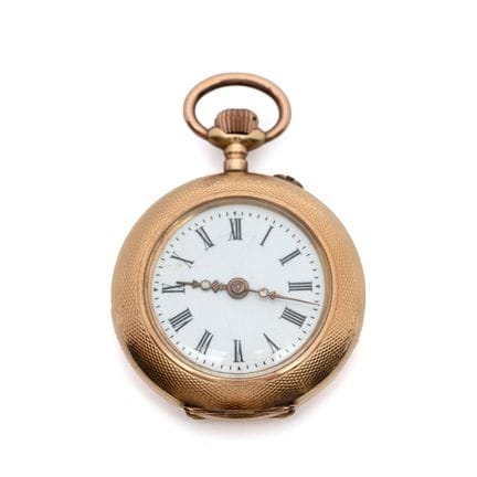Petite montre de poche en or. Le cadran est en éma