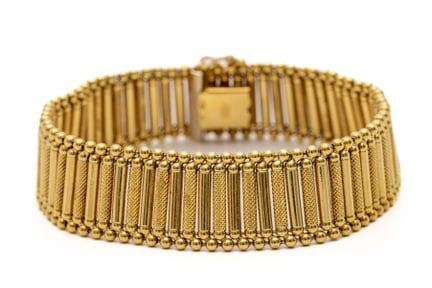 Bracelet vintage composé de barrettes et de perles