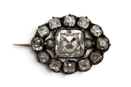 A late 19th-century diamond brooch. Set in the cen