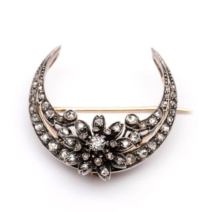 A French, late 19th-century diamond crescent brooc