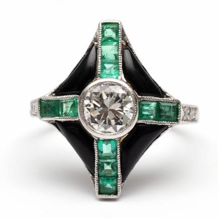 Bague Art déco sertie de diamants et d'émeraudes. 
