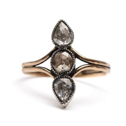 A late 19th-century diamond ring. Set vertically w