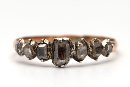 A seven-stone diamond ring, ca. 1800.Set with seve