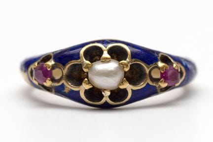 A 19th-century ring with pearl and ruby enamel. Th
