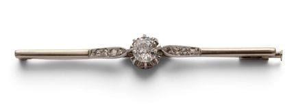 Broche en forme de barre de diamant, sertie au cen