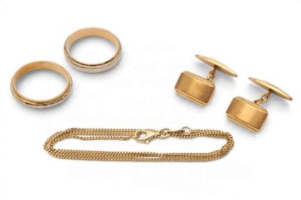 Divers bijoux : une paire de boutons de manchette 