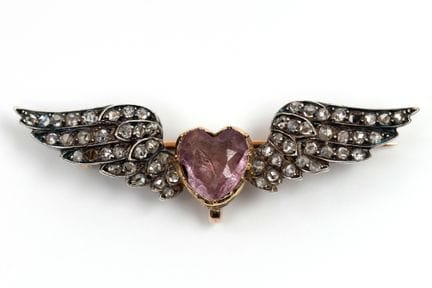 A French 19th-century winged heart brooch. The hea