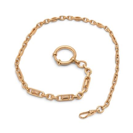 Una cadena de reloj de oro compuesta por eslabones