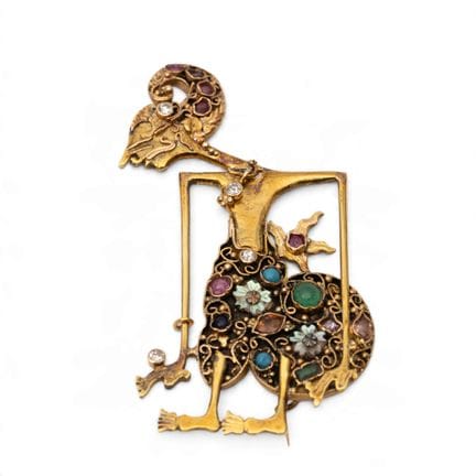 Broche et pendentif Wayang indonésiens sertis de p
