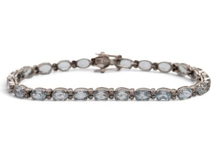Bracelet français en topazes et diamants, composé 