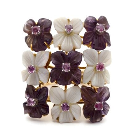 Bague de cocktail en fil d'or, composée de neuf fl