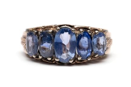 A five-stone sapphire ring. Set with oval-faceted 
